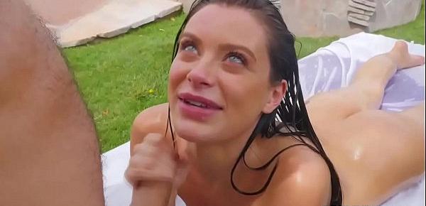  Horny cutie finds herself oiled and fucked beside a pool